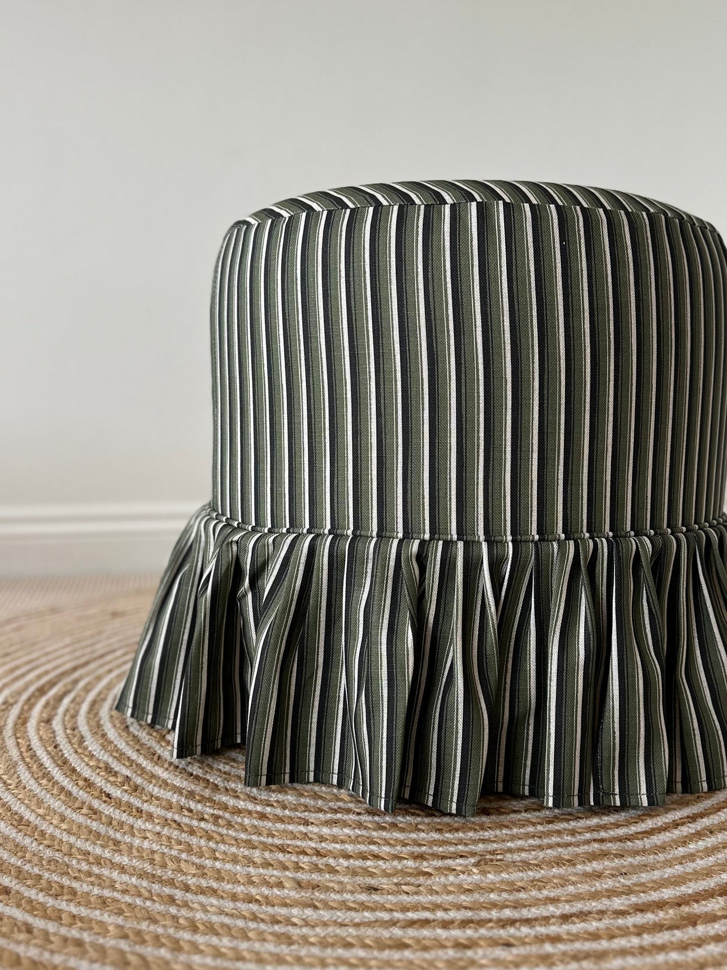 Trendel ottoman with frill slipcover