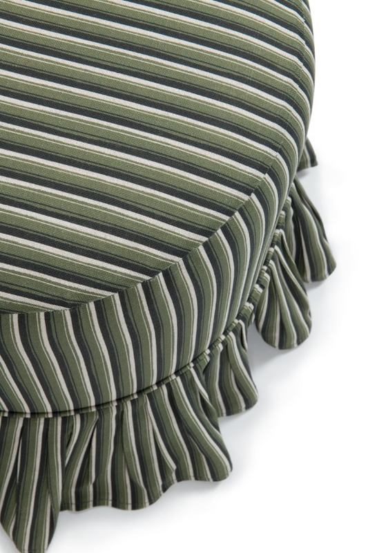 Close-up of a striped fabric frill slipcover Trendel drum ottoman with ruffled trim, featuring vertical stripes in olive green, cream, and dark green on a white background.