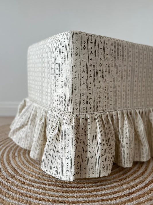 Skapa Ottoman with frill slipcover
