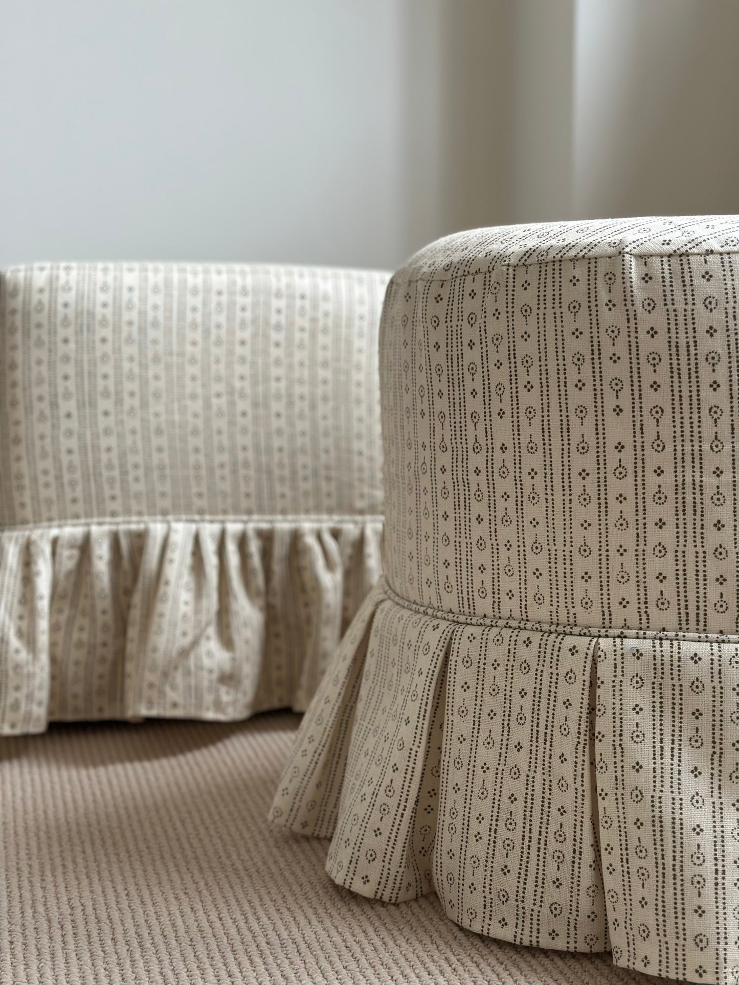 Trendel ottoman with box pleat slipcover